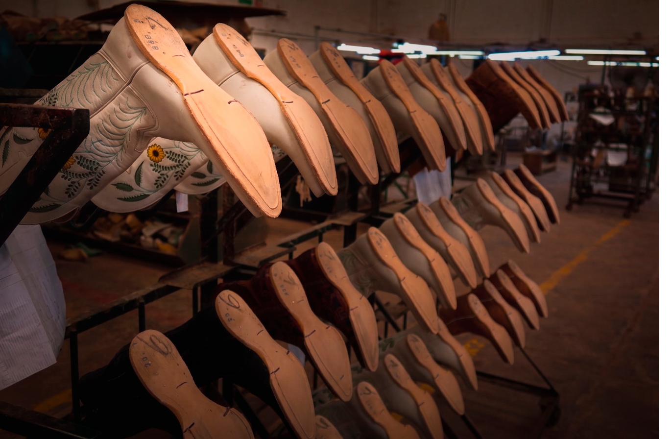 Wooden boot lasts lined up inside the Don Quijote Boots workshop in León, México.